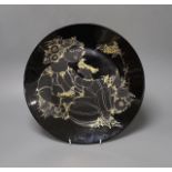 Bjorn Winblad for Rosenthal a gilt decorated black ground charger, 32.5cm diameter