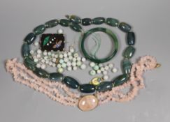 Assorted costume jewellery including hardstone and rose quartz necklaces and a pietra dura brooch.