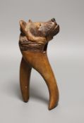A pair of Black Forest walnut Bear’s head nutcrackers, 19cm