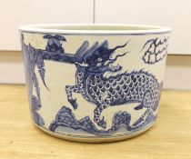 A large Chinese blue and white ‘dragon’ jardiniere, 40cm diameter