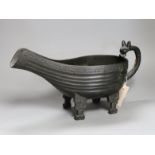 A large Chinese archaistic cast bronze pouring vessel, yi, boxed. 42cm