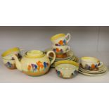 A group of Clarice Cliff crocus pattern tea wares, teapot 22 cm across