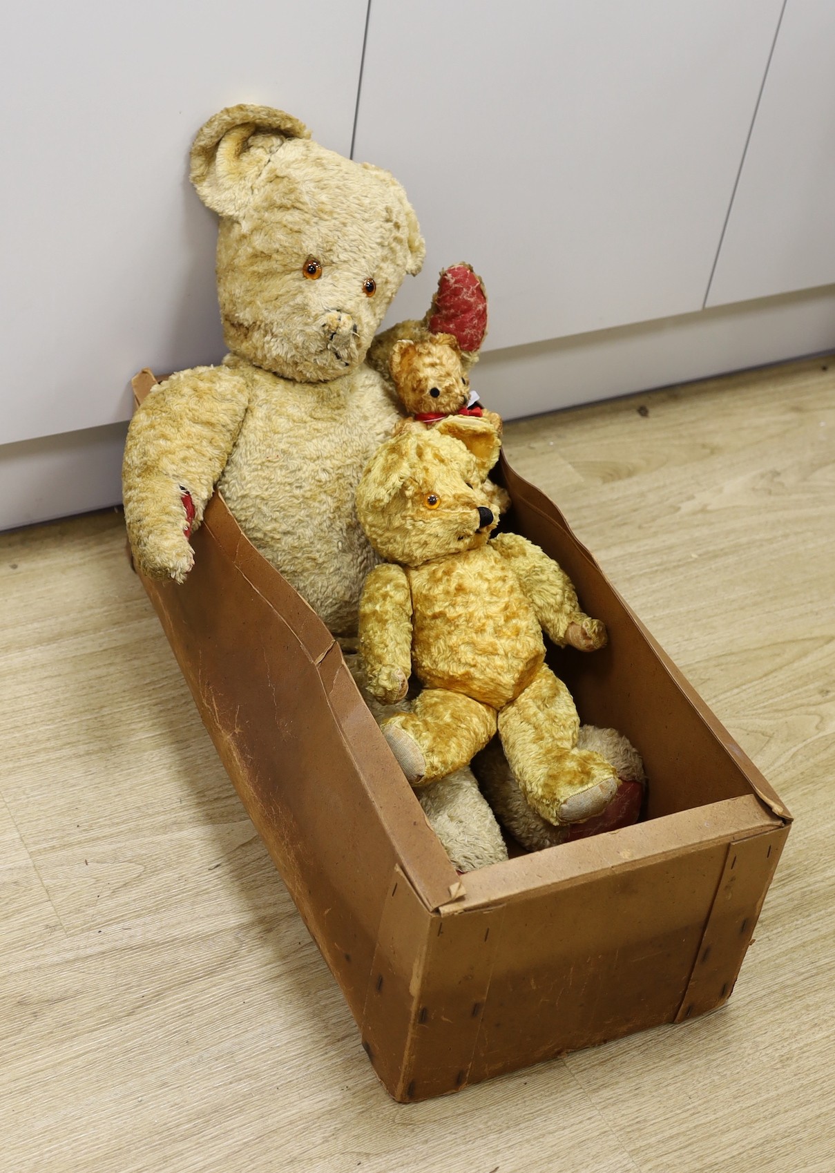 Three 20th century, 1950’s cotton plush teddy bears,tallest 78 cms high,