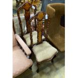 A pair of late 18th century Dutch walnut and marquetry dining chairs