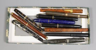 Eleven assorted fountain pens including Parker Vacumatic and Kingswood.