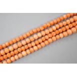 Two single strand coral bead necklaces, one a.f., longest 103cm.