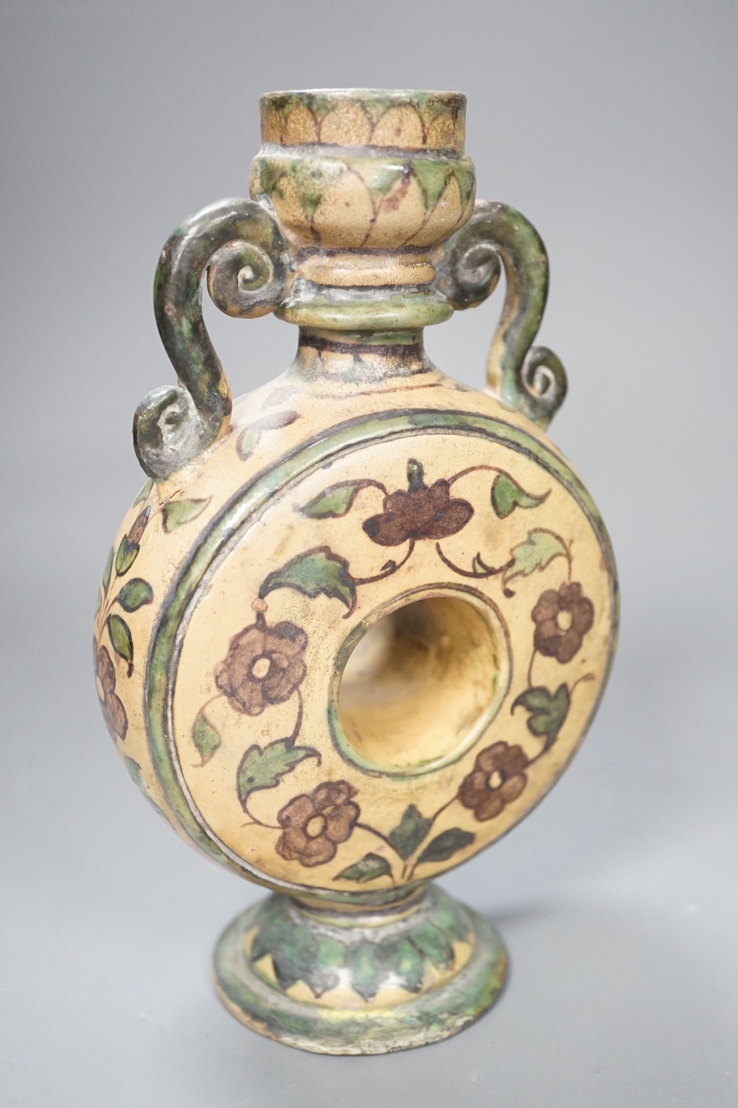 A polychrome painted terracotta vase, 20cm