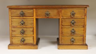 A late 19th century walnut model of a pedestal desk. W- 48cm, H - 27cm, D - 22cm