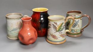 Three Glyn College jugs, a flambé Poole vase and a Burmantoft ‘White’ dimpled vase no. 989,