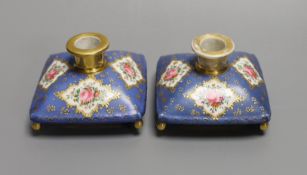 A pair of mid 19th century Paris porcelain 'cushion' shaped scent bottles decorated in Sevres