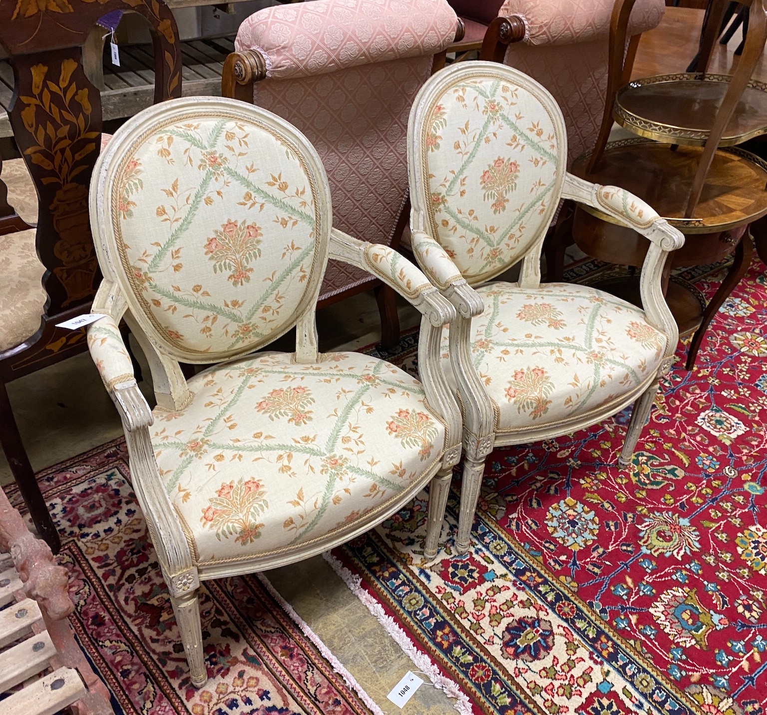 A pair of Louis XVI style cream painted fauteuils, width 58cm, height 90cm - Image 2 of 2
