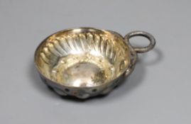 An early 20th century French white metal taste vin, 19cm.