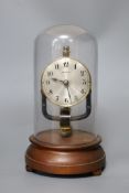 A Bulle electric clock under a glass dome,28 cms high,