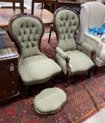 A pair of Victorian carved walnut spoon back chairs, one with arms together with a similar