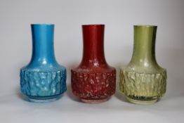 Three Whitefriars cylindrical bottle vases, in red, kingfisher blue and sage green glass (3) each