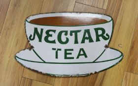 A Nectar Tea advertising enamel sign, in the form of a teacup and saucer,height 32 cms,