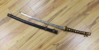 A Japanese katana, possibly a theatrical prop101 cms long,