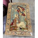 A Persian part silk pictorial rug, 100 x 68cm
