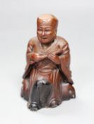 A Chinese composition figure of a seated musician, 12cms high,