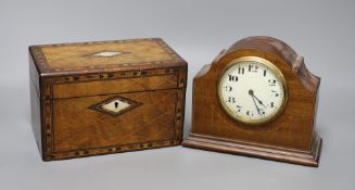 A Victorian walnut and marquetry tea caddy and an inlaid mahogany mantel timepiece,box 20 cms wide