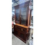 A late Victorian carved walnut secretaire bookcase, width 123cm, depth 48cm, height 234cm