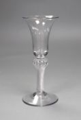 A knopped air twist stem fluted glass, 18th century, 15.5cm tall