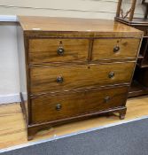 A small George IV mahogany chest of two short and two long drawers, width 90cm, depth 50cm, height