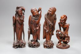 Four Chinese boxwood figures of a luohan and three immortals, early 20th century, tallest 20cm