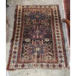 An antique Caucasian rug, 156 x 110cm