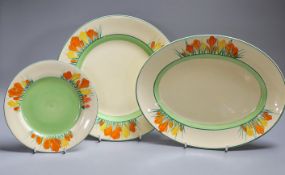 Clarice Cliff Sungleam, three crocus pattern plates,