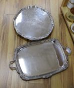 A large silver plated two handled tray and a similar salver,tray 65 cms wide,