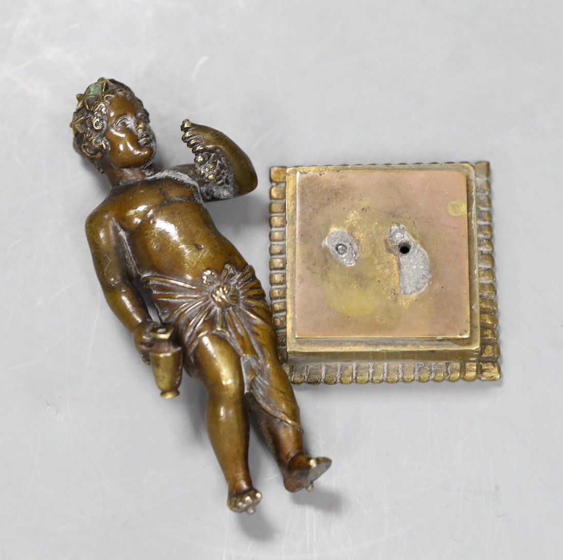 A 19th century Grand Tour souvenir bronze figure a Bacchanlian putti, 9cms high,
