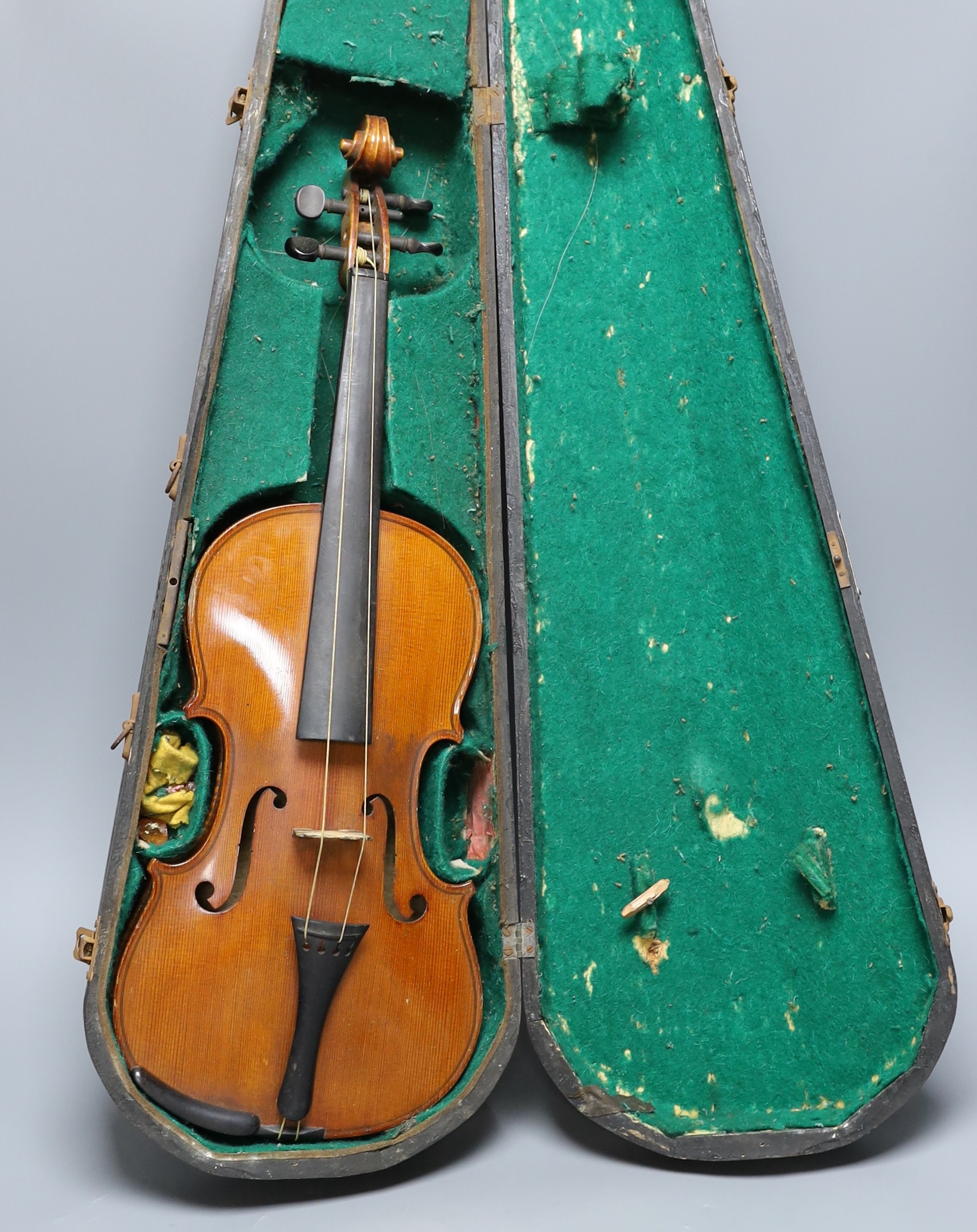 An early 20th century cased violin, length of back 36 cm