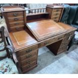 A late Victorian mahogany pedestal desk with hinged slant front, width 137cm, depth 73cm, height