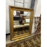 A large Victorian style rectangular gilt framed wall mirror, width 122cm, height 156cm