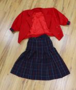 Two vintage Burberry items of clothing: a pleated skirt and a red Harrington jacket,