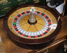 A wood and chrome Technical Casino Supplies roulette wheel, 80 cm diameter, please note this is