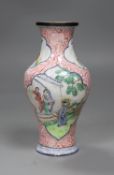 A Chinese Canton enamel vase, Qianlong mark, late 18th / 19th century, 16.5cm tall