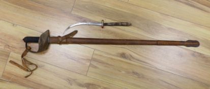 A George V military dress sword in brown leather covered scabbard, 102cm long, and a Middle