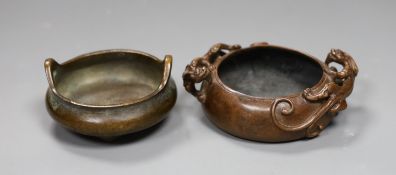 Two Chinese bronze censers, largest 11cms diameter,