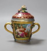A Vienna style two handled porcelain chocolate cup and cover, c.1900, 13cms high,