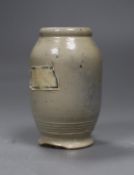A Martin Brothers cream glazed vase, incised mark, 10.5cm tall
