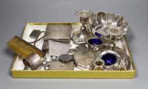 Assorted silver including a pierced bowl, pair of dwarf candlesticks, four condiments(a.f.),
