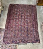A Bokhara red ground rug, 160 x 112cm