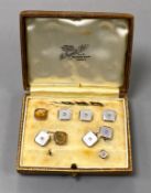 An early to mid 20th century part set of 18ct & 9ct, mother of pearl and diamond set octagonal dress