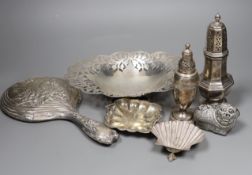 Mixed silver and white metal items including two silver casters, a silver mounted hand mirror, an