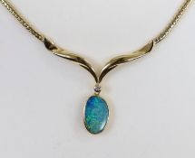 A modern 585 yellow metal and black opal doublet? and diamond set drop pendant necklace, overall