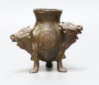An Indian bronze ox monopdia vessel, 11cms high,