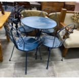 A circular painted aluminium garden table, diameter 70cm, height 72cm and four chairs