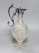 An electroplate mounted cut glass claret jug, 29 cms high,